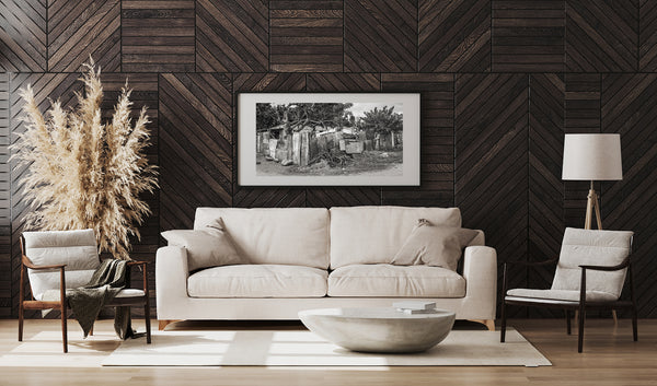 Black and white photo of rustic Cuban house
