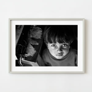 Black and white portrait of young girl with expressive eyes