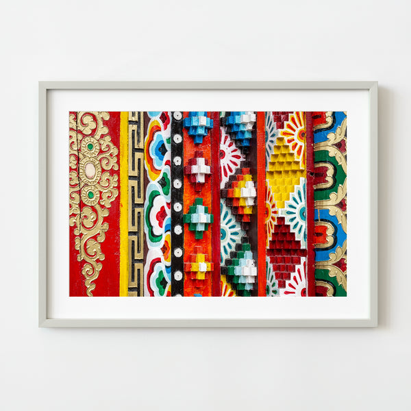 Vibrant Tibetan woodwork wall art