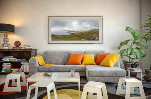 Low coastal hills and rocky foreground on Ireland’s Dingle Peninsula.