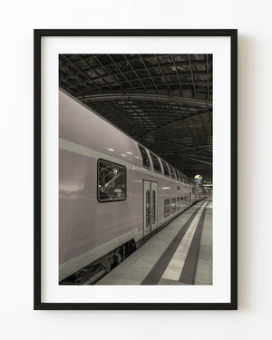 Double decker train beside a platform at Dresden station