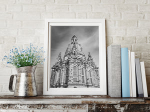 Dresden Frauenkirche stonework against a cloudy sky