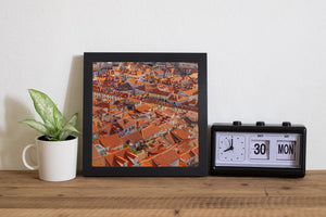 Dubrovnik cityscape with terracotta roof tiles and narrow spaces between buildings