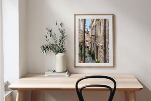 Colour street photograph of stone stairs and daily-life details in Dubrovnik