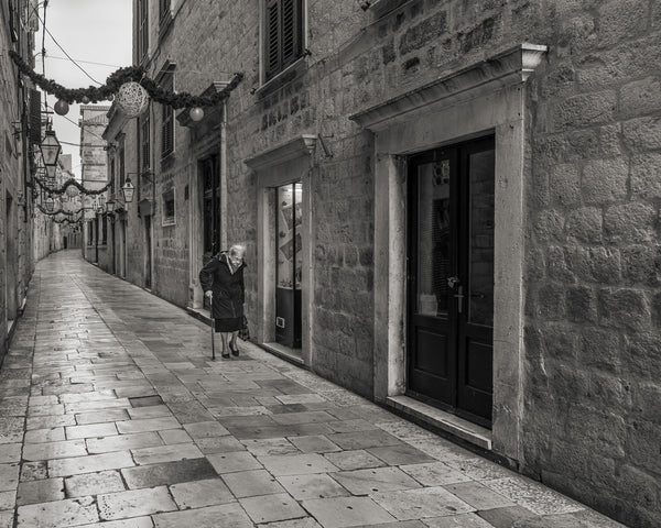 Dubrovnik street with an elderly woman walking | Photo Art Print fine art photographic print