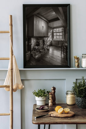Rustic Dutch kitchen with a hearth and quiet window light