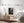 Historic Dutch dining table beneath wooden ceiling beams