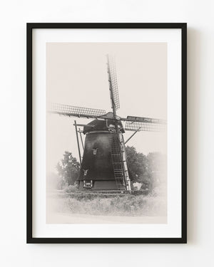 Sepia Dutch windmill with lattice sails near Amsterdam