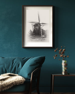 Traditional Netherlands windmill in a quiet sepia landscape