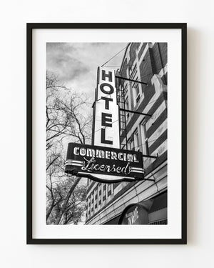 Commercial Hotel sign above a brick façade on Edmonton’s Whyte Avenue in black and white