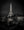 Paris night photograph of the Eiffel Tower across the Seine with boats in the foreground