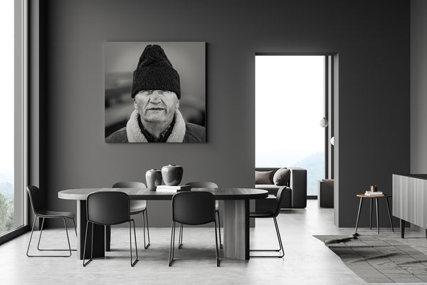 Stoic Romanian man with textured hat – black and white