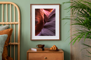 Intimate canyon scene with glowing red rock