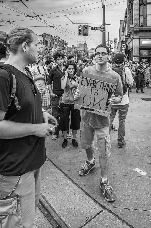 Black and white protest Toronto G7 Summit