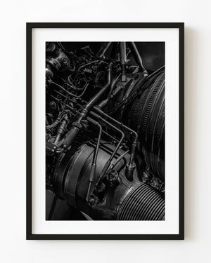 F1 rocket engine tubing and ribbed metal photographed in black and white.