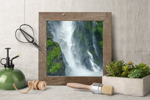 Natural water and stone textures in lush fjord terrain