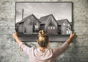 Canadian leaf adorned on fishing hut peaks in PEI
