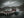 Aerial view of red fishing buildings and boat in Mortsund