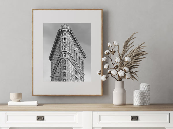 Flatiron Building towering over New York City streets
