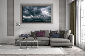 A thin pale horizon separates turbulent clouds from the Florida seascape.