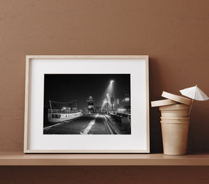 Moody night scene at Aker Brygge pier wall art