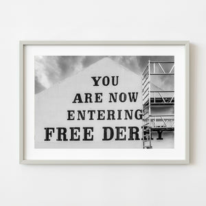 Free Derry mural on Bogside gable wall in black and white