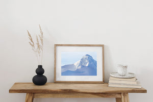 Snow-Covered Antarctic Mountain with Soft Blue Shadows