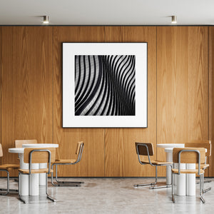 Alternating pale windows and dark bands create a flowing geometric pattern