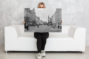 Black and white travel photograph of Gdańsk with bare trees and ornate historic buildings