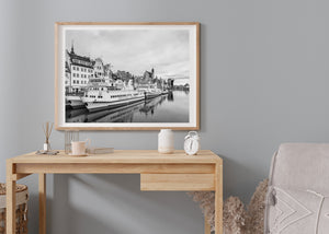 Gdańsk’s gabled façades rise behind the Rubin passenger boat beneath an overcast sky