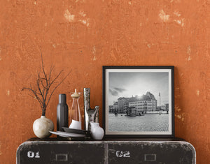 Black and white photograph of German architecture beneath a pale evening sky