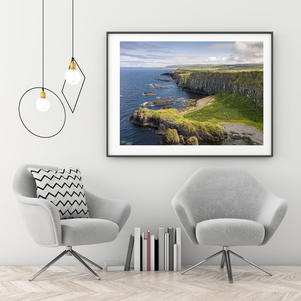 Dramatic cliffs and clear blue waters of Northern Ireland