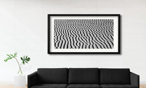 Close-up photograph of wind-sculpted sand ridges in the Gobi Desert