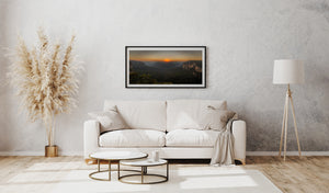 A wide Australian landscape shows dawn above rugged Blue Mountains scenery