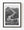 The Great Wall’s winding path climbs toward mountain watchtowers in black and white