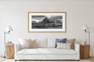 Hamnøy Village with snow-covered mountains