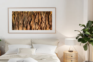Hanging tobacco leaves in rows inside traditional Cuban farm barn