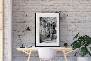 Havana interior photograph showing surreal wall art beside rough stairs and household objects.