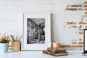 Painted animal mural and worn stairway in an old Havana room with exposed wooden beams.