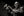 Close portrait of Cuban jazz vocalist holding microphone on stage