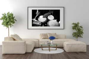 Drumheads and a percussionist’s hands fill a black and white Havana music photograph.