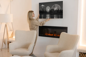 Frozen lake reflecting city lights and carnival rides