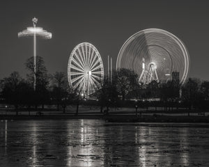 Long exposure of spinning amusement ride at night