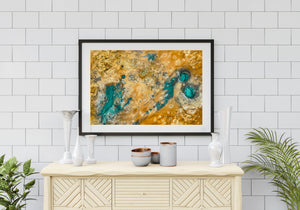 Bright turquoise geothermal pools interrupt a broad expanse of gold and grey earth in Iceland.
