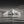 Jagged glacier iceberg reflected in calm Iceland water