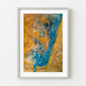 Aerial view of turquoise geothermal river flowing through Iceland mineral earth