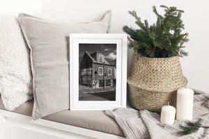 Nordic city house with graffiti wall in black and white