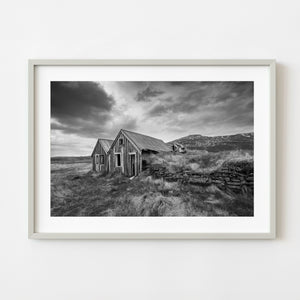 abandoned turf farmhouse in rural Iceland black and white landscape