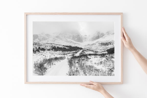 Snowy road through Norwegian wilderness