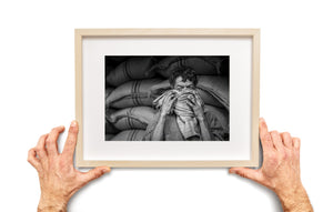 close up of elderly man in grain storage shop India
